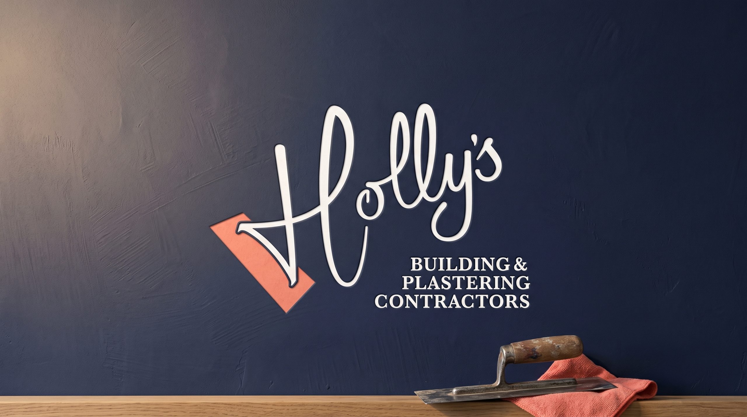 Holly's brand on a plaster wall